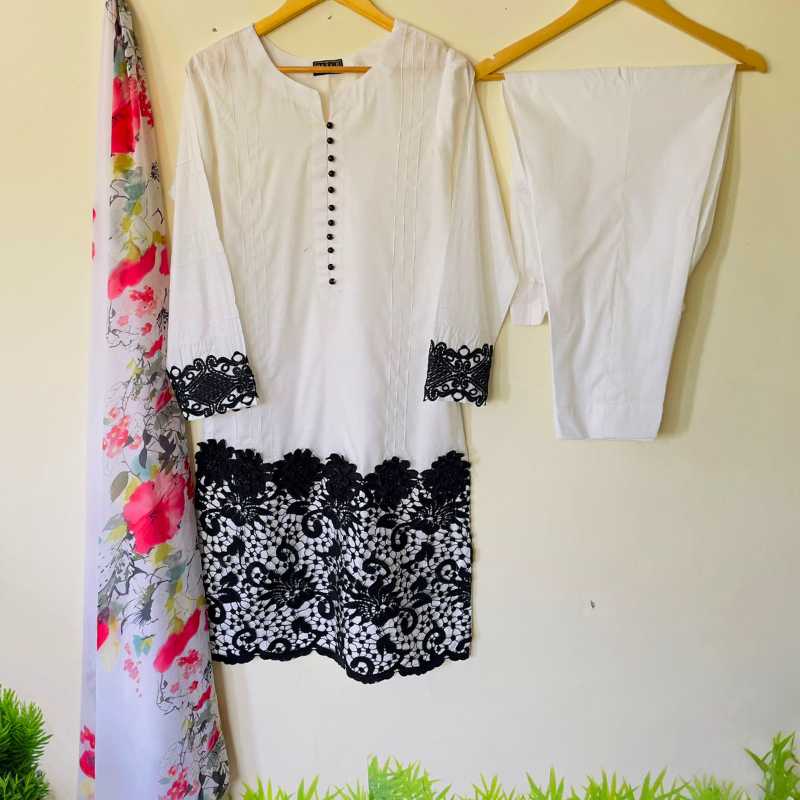 3-piece White Lawn Dress with Vibrantly Printed Chiffon Dupatta and Comfortable White Lawn Trousers.