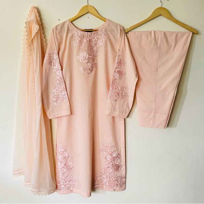 3-piece Embroidered Peach Lawn Dress with Laced Chiffon dupatta and matching lawn trousers.