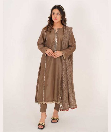 3-piece Brown Raw Silk Dress with Net Dupatta and matching raw silk trousers.