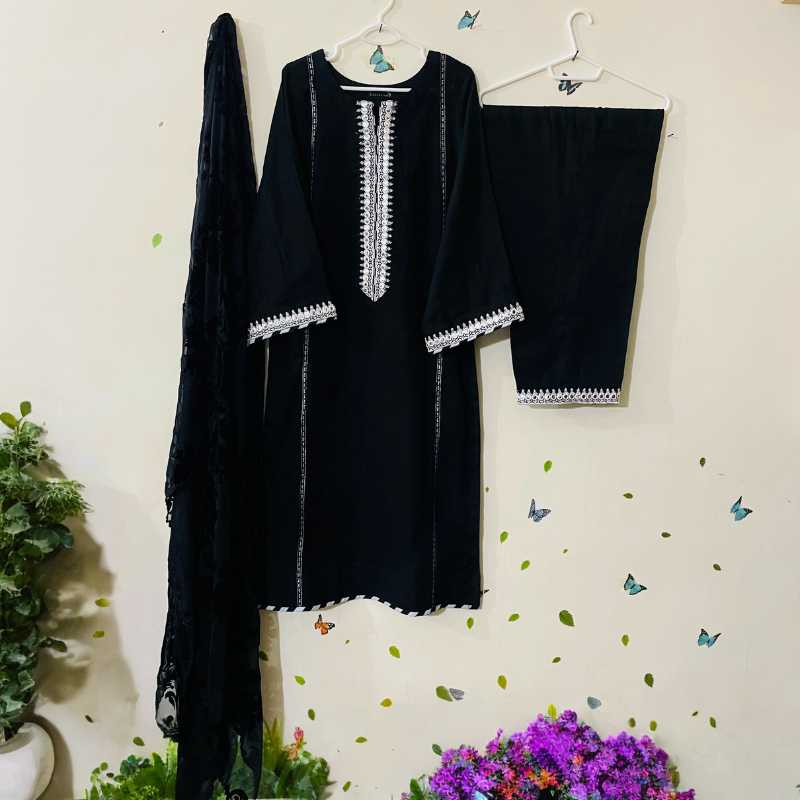 3-piece Black Khaddar Dress with Black Khaddar Trousers and a Black Plachi Dupatta.